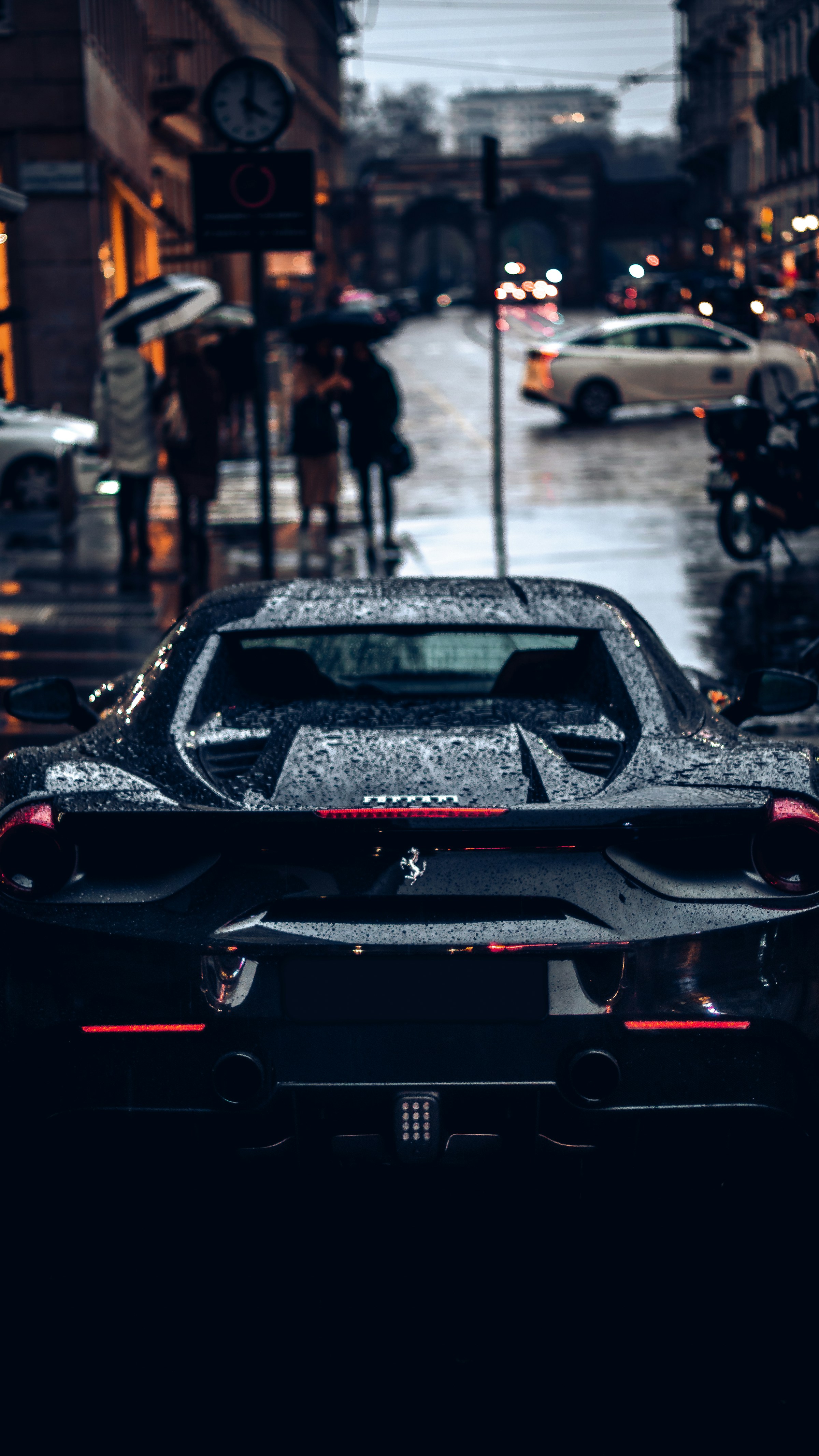 Sports car with rain on its bodywork